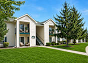 Thumbnail 5 of 21 - Two story apartment buildings with exterior staircases at Northview Park Apartments, Sterling Heights, MI 48310