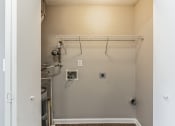 Thumbnail 15 of 26 - an empty room with a closet and a white wall