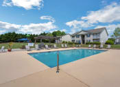 Thumbnail 21 of 26 - the preserve at ballantyne commons community swimming pool with house in the background