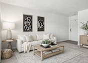 Thumbnail 8 of 12 - A living room with a white couch, a coffee table, and two abstract art pieces on the wall.