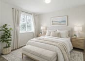 Thumbnail 6 of 9 - A bedroom with a large bed, a potted plant, and a framed picture on the wall. at Diamond Fork Apartments, Utah