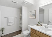 Thumbnail 9 of 9 - A white bathroom with a toilet, sink, and a plant. at Diamond Fork Apartments, Utah, 84660