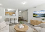 Thumbnail 4 of 9 - A living room with a couch, chairs, a coffee table, and a painting on the wall. at Diamond Fork Apartments, Spanish Fork, 84660