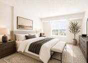 Thumbnail 4 of 5 - Spacious bedroom with modern furnishings at Lakewood Apartments, Lino Lakes, 55014