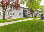 Thumbnail 12 of 13 - our apartments showcase a beautiful lawn