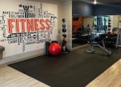 Thumbnail 55 of 56 - the gym has a large wall with a quote on it