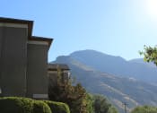Thumbnail 11 of 13 - a view of the mountains in the distance from a house
