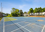 Thumbnail 22 of 28 - the tennis courts at the whispering winds apartments in pearland tx