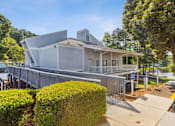 Thumbnail 28 of 28 - a house with a dock next to a body of water