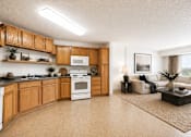 Thumbnail 5 of 5 - Open concept kitchen and living room with natural light at Lakewood Apartments, Minnesota