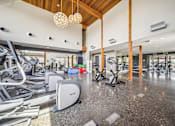 Thumbnail 9 of 24 - Fitness with cardio and strength equipment at Lofts at Innovation Center Apartments, Richland, Washington