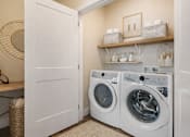 Thumbnail 27 of 27 - Laundry Room at Momentum at First Creek, Denver, Colorado
