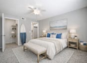 Thumbnail 24 of 31 - A bedroom with a surfboard leaning against the wall. at Waterbridge Apartments , Florida