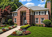 Thumbnail 2 of 12 - A red brick house with a grey roof and a grey door.