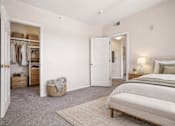 Thumbnail 19 of 21 - Spacious bedroom with walk-in closet and ensuite bathroom at Stetson Meadows Apartments, Colorado Springs, Colorado
