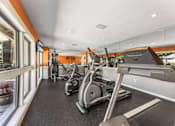 Thumbnail 14 of 28 - A gym with treadmills, exercise bikes, and other equipment. at Epic Apartments , Apartments, Daytona Beach, FL