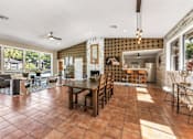 Thumbnail 18 of 28 - A dining room with a table set for six. at Epic Apartments , Daytona Beach, FL, 32114