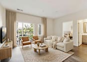 Thumbnail 11 of 25 - A living room with a white couch and a television at Aster Meadow, Vadnais Heights, MN, 55127