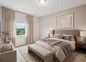 Thumbnail 21 of 25 - A bedroom with a large bed and a window with curtains at Aster Meadow, Vadnais Heights, MN, 55127