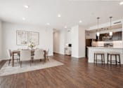 Thumbnail 14 of 25 - Open concept kitchen and dining area at Connect at First Creek Apartments, Colorado