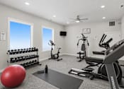 Thumbnail 15 of 26 - Fitness center with cardio and weight equipment at Park Station Apartments, Midvale, 84047