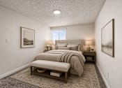 Thumbnail 17 of 26 - Bedroom with upholstered bed and neutral decor at Park Station Apartments, Midvale