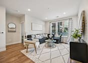 Thumbnail 26 of 39 - Bright living room with modern furniture at Sequel Homes Apartments, Englewood, CO