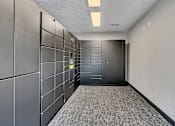 Thumbnail 9 of 14 - Mail room with secure parcel lockers at Grand Gateway Apartments, St Cloud, 56301