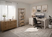 Thumbnail 37 of 40 - Home office with white desk and shelving unit at Prosper West Apartments, Minnesota