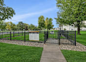 Thumbnail 25 of 40 - Bark park rules sign at fenced dog area at Prosper West Apartments, Waite Park, MN 56387