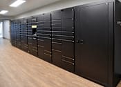 Thumbnail 14 of 25 - Package locker system in resident hallway at Regency Park Apartments, Minnesota