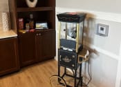 Thumbnail 52 of 56 - a room with a vending machine in the corner