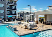 Thumbnail 3 of 27 - Outdoor Swimming Pool at Momentum at First Creek, Denver