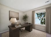 Thumbnail 21 of 21 - Home office with dark wood desk and natural light at Northview Park Apartments, Sterling Heights, 48310