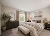Thumbnail 19 of 21 - Cozy bedroom with neutral tones and layered bedding at Northview Park Apartments, Michigan