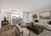 Thumbnail 14 of 21 - Open concept living room with bar seating at Northview Park Apartments, Sterling Heights, MI
