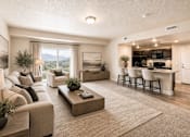 Thumbnail 11 of 20 - Open living room with mountain view and breakfast bar at The Ellison Apartments, Layton, UT