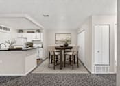 Thumbnail 14 of 37 - A kitchen with a dining table and chairs.