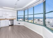 Thumbnail 60 of 95 - A kitchen with a view of the city.