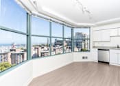 Thumbnail 62 of 95 - A kitchen with a view of the city.