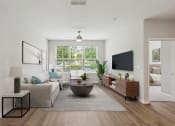 Thumbnail 2 of 54 - a living room with white walls and a large window at Two Addison Place Apartments , Georgia