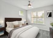 Thumbnail 3 of 54 - a bedroom with a large bed and two windows at Two Addison Place Apartments , Georgia