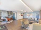 Thumbnail 29 of 30 - lobby area with couches and chairs at Sycamore at Tyvola, Charlotte, 28217