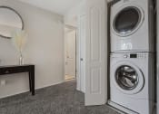 Thumbnail 12 of 16 - Laundry Room at Kenilworth at Charles Apartments, Maryland