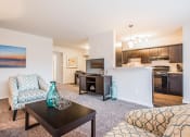 Thumbnail 2 of 12 - Open living room kitchen and dining area at Brook View Apartments, Baltimore, Maryland