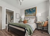 Thumbnail 7 of 31 - A bedroom with a bed, desk, and chair at 1010 Dilworth Apartments, North Carolina, 28204