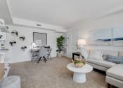 Thumbnail 1 of 9 - Living room at Cross Country Manor Apartments, Baltimore, Maryland