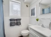 Thumbnail 5 of 9 - Bathroom with Window at Cross Country Manor Apartments, 3301 Clarks Lane, Baltimore