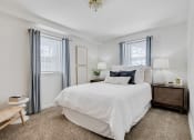 Thumbnail 4 of 9 - Bedroom with two windows at Cross Country Manor Apartments, Baltimore, 21215