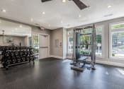Thumbnail 17 of 20 - Fitness Center Strength Equipment at The Village Apartments, Raleigh, NC